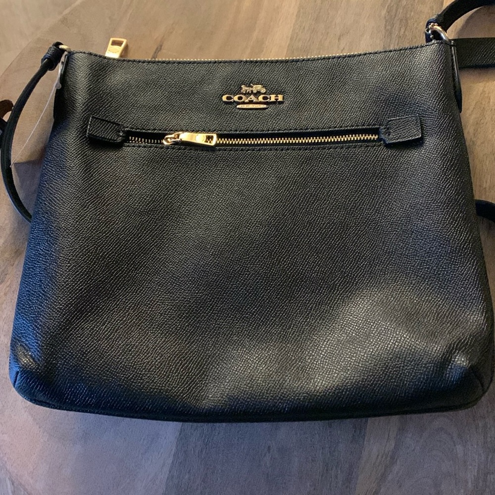 New with tags black Coach Outlet crossbody. LTH Rowan File Bag